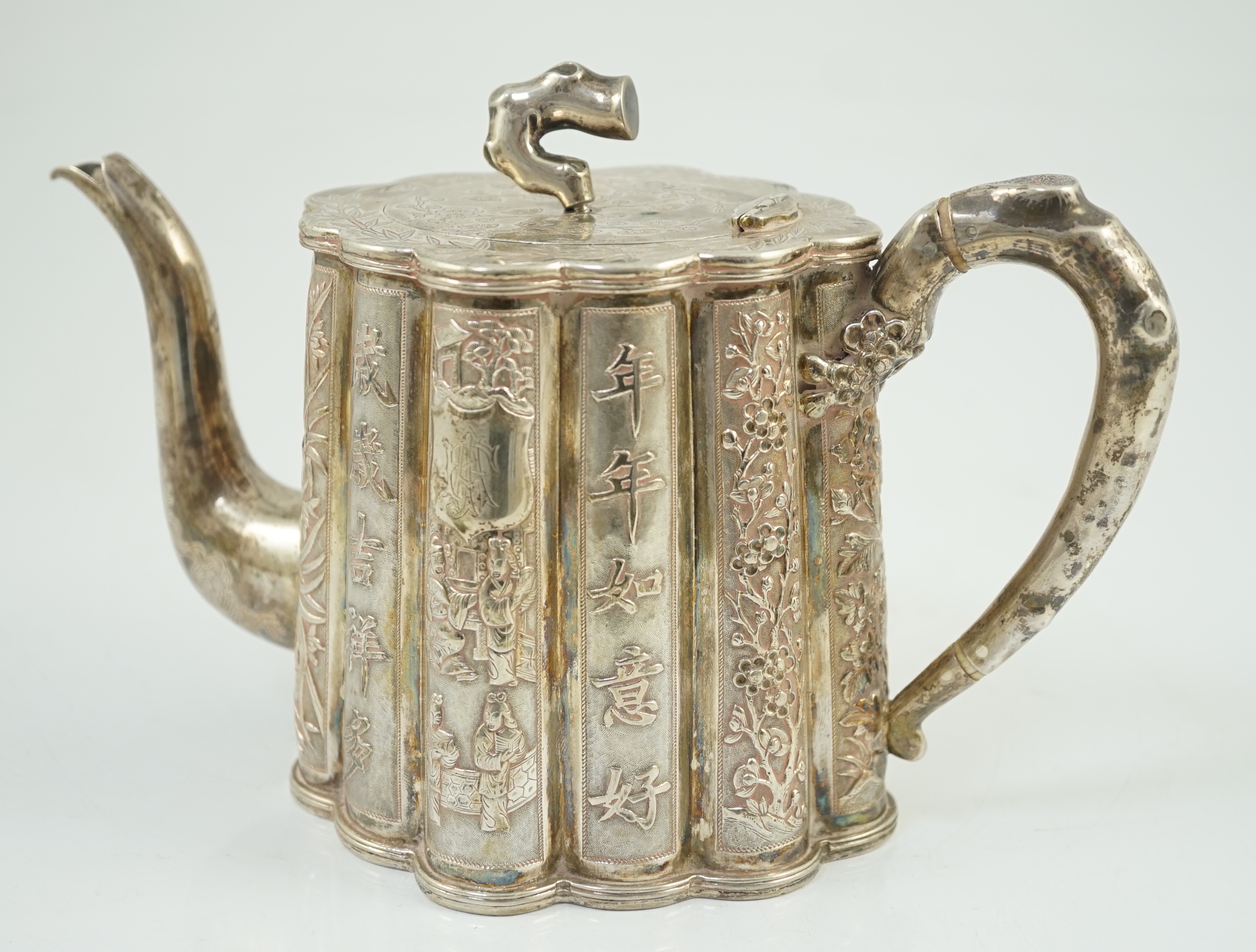 A late 19th/early 20th century Chinese Export silver teapot, by Luen Wo, Shanghai